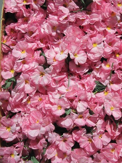 Nine boxes of silk flowers, comprising: one of blue and: Nine boxes of silk flowers, comprising: one of blue and beige sprays (20); one of white and pink roses (40); one of soft pink pansy sprays with pins (145); one of apricot and lemon roses (45); one of 