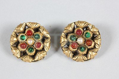 Two pairs of Chanel earrings, one pair of gilt rosettes: Two pairs of Chanel earrings, one pair of gilt rosettes with green and red stones, and pearl centres, signed and dated 1985; the other pair of gilt flowers set with pearl beads, signed (4)
