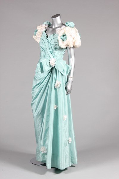 A group of 1980s clothing, nine ensembles including: A group of 1980s clothing, nine ensembles including Bellville Sassoon aqua taffeta ball gown trimmed with white organza blossom, white taffeta sleeves; a Givenchy boutique black lurex and velvet cockt