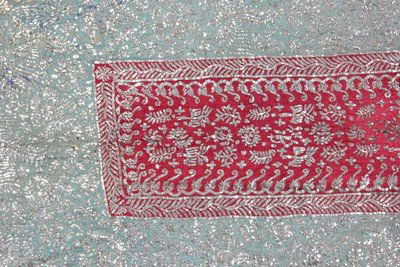 An embroidered stole, Sino-Indian, mid 19th century,: An embroidered stole, Sino-Indian, mid 19th century, the red and green silk ground worked in gilt strip with dense design of flowerheads and phoenix, gold bobbin lace edging, 51 by 152cm