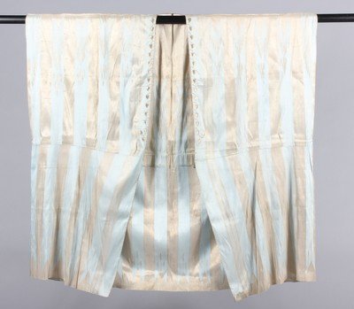 A pale blue and silver Aba, Syrian, second half 19th: A pale blue and silver Aba, Syrian, second half 19th century, the front opening embellished with silver thread embroidered leaves