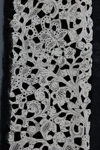 A large group of Milanese bobbin lace flounces and: A large group of Milanese bobbin lace flounces and edgings, mainly 17th century, approx 15 pieces, including panel cut to form a stomacher and two others mounted onto velvet, all worked with character