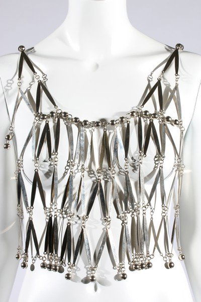 A Paco Rabanne silvered metal bodice, probably 1990s,: A Paco Rabanne silvered metal bodice, probably 1990s, with oval Paco Rabanne tag to the back, formed from a lattice of elliptical plates, edged in bells, bust approx 86-92cm, 34-36in