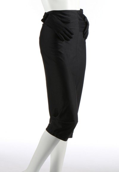 A pair of Rei Kawakubo/Commes des Garçons navy: A pair of Rei Kawakubo/Commes des Garçons navy polyester breeches with attached padded hands to the waist, Autumn-Winter, 2007, printed ribbon label, low-set crotch, size SS