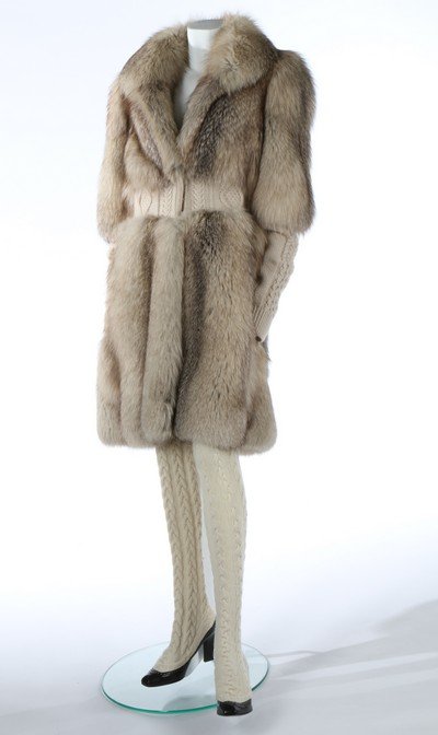 An Alexander McQueen fox and cashmere knit coat and: An Alexander McQueen fox and cashmere knit coat and matching stocking-boots, 'The Girl Who Lived in the Tree' collection, Autumn-Winter, 2008-9, with woven label and metal tag, size 42, with beige ara