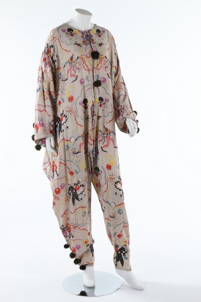 A group of mainly printed cotton fancy dress outfits,: A group of mainly printed cotton fancy dress outfits, 1920s-30s. including a pierrot costume with 'golly' and Charlie Chaplin prints, wool pompoms; US flag ensemble; others with clowns and Mickey Mous