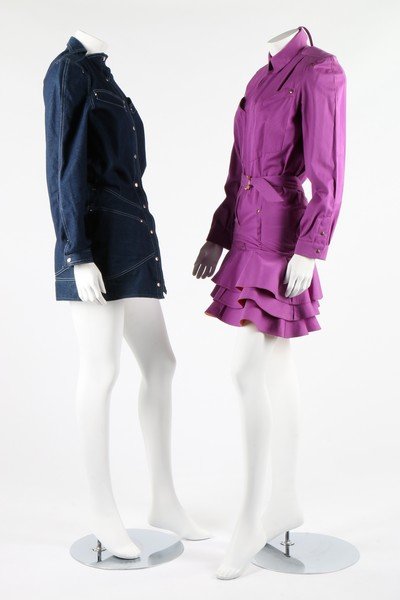 A group of designer clothing, late 1970s and 1980s.: A group of designer clothing, late 1970s and 1980s. including 1983 Thierry Mugler magenta cotton dress with flounced, tiered hem; Mugler denim dress; three early Antony Price parachute silk dresses wi