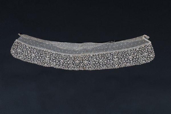 An interesting figurative panel of needlepoint lace,: An interesting figurative panel of needlepoint lace, probably Spanish, late 17th century. worked with serpents, faces and double-headed eagles, hearts, 7 1/2 by 71cm Provenance: Pat Earnshaw This lace