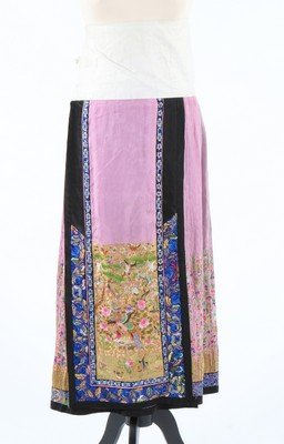A lady's embroidered mauve silk lantern pleated skirt,: A lady's embroidered mauve silk lantern pleated skirt, Chinese, circa 1910. the front and back densely embroidered with couched gilt flowerheads and floss silk embroidery of peacocks, rocky pools, man