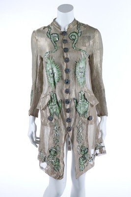 A Jean-Paul Gaultier painted and embroidered silk gauze: A Jean-Paul Gaultier painted and embroidered silk gauze jacket, Spring-Summer, 1994, printed label with Imperial crown and radiating arrows 'Paris' below, cut in 18th century style with irregular shel