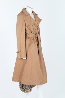 A Chanel beige cotton trench coat with detachable: A Chanel beige cotton trench coat with detachable knitted lining, circa 2000, labelled, double-breasted with wooden Chanel buttons, chest 101cm, 40in