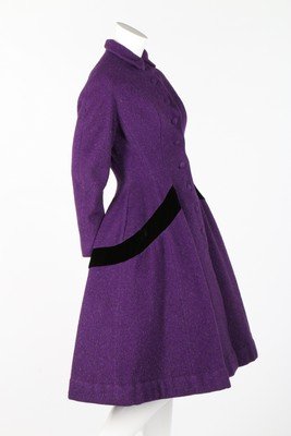 A Lilli Ann violet tweed coat, mid 1950s, with San: A Lilli Ann violet tweed coat, mid 1950s, with San Francisco Original label, with curved velvet insertions circling the hips, bust 92cm, 36in, waist 76cm, 28in; together with two 1950s dinner dresses,