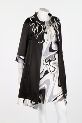 A Pucci evening dress and coat, modern, coat labelled: A Pucci evening dress and coat, modern, coat labelled Emilio Pucci, size 38, the mono-chromed patterned shift dress with silver lurex cut out detail to the front, the black satin coat, lined and edged
