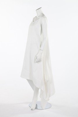 Two Comme des Garcons white dresses from the 'Body: Two Comme des Garcons white dresses from the 'Body Meets Dress' or 'Bump' collection, Spring-Summer, 1997, comprising: white Triacetate shift dress with small bump to left waist area, the other of cot