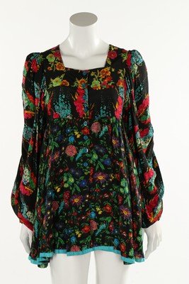 A Jeff Banks floral blouse, late 1960s, labelled, with: A Jeff Banks floral blouse, late 1960s, labelled, with full sleeves, empire-line bust, bust 86cm, 34in; together with a Simon Ellis colourful polka-dot ensemble, labelled, comprising long-sleeved crop