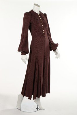 A Biba brown cotton dress, late 1960s, with woven: A Biba brown cotton dress, late 1960s, with woven art-deco label, with plastic heart shaped buttons and triangular pockets to front, bust approx 86cm, 34in