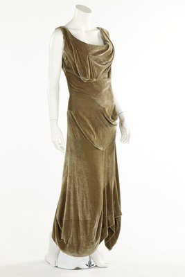 A group of 1980s and 90s evening wear, including: A group of 1980s and 90s evening wear, including Vivienne Westwood olive green velvet gown with integral corset; Nina Ricci boutique green dress with faux-fur collar and cuffs; Valentina of London bla
