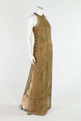 An Emilio Pucci sequined tulle and nude silk evening: An Emilio Pucci sequined tulle and nude silk evening gown, modern, labelled and UK size 10, the tulle over-dress embroidered with a coiling Chinese dragon, with sage green chiffon tunic worn over; tog