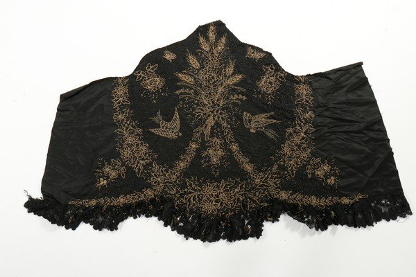 A large and interesting group of trimmings, beadwork,: A large and interesting group of trimmings, beadwork, dress trimmings, scarves, metal lace, fabric documents, hat veils and others, mainly 19th and early 20th century, including a good Edwardian skirt