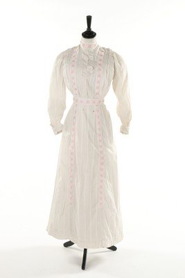 A group of mainly Edwardian whites and lace, including: A group of mainly Edwardian whites and lace, including a ribbon-slotted lawn dress, white work embroidered skirt, assorted blouses including chemical lace and white-work examples, assorted needle-run 