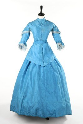 A group of Victorian clothing 1860s-90s, including: A group of Victorian clothing 1860s-90s, including bright blue taffeta gown 1860s, altered in the 1870s; Paisley printed cotton morning dress 1870s; Indian embroidered beige raw silk day dress c.1890,