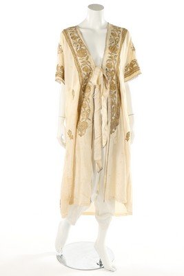 A gold embroidered ivory silk tunic, Ottoman circa: A gold embroidered ivory silk tunic, Ottoman circa 1920, together with a striped brick red and ivory jacket and trousers with gold strapwork c.1910-20; together with three assorted Syrian and other sh