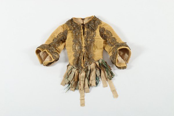 A yellow silk jacket trimmed with metal lace, possibly (1 of 8)