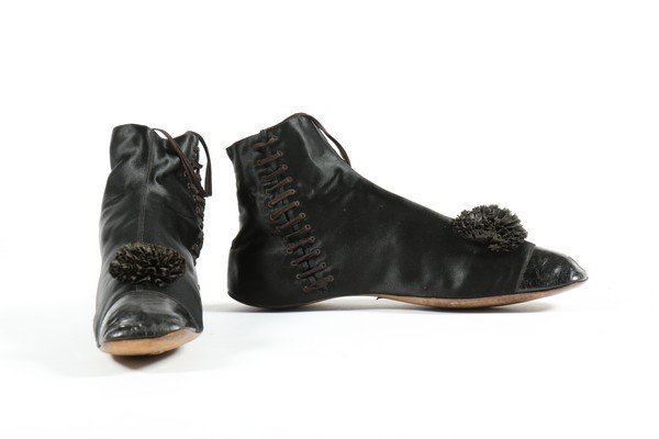 A pair of black satin ankle boots, circa 1840-50, with (1 of 7)