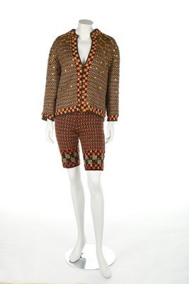 A Jean-Paul Gaultier knitted jewelled cardigan and: A Jean-Paul Gaultier knitted jewelled cardigan and breeches, 1980s, Maille labelled, chest 102cm, 40in, waist 61cm, 24in (2)