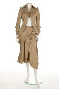 A Junya Watanabe/Comme des Garçons 'trench-coat': A Junya Watanabe/Comme des Garçons 'trench-coat' ensemble, Spring-Summer 2006, labelled and size SS and S, the jacket with slightly puffed, padded shoulders, with pocket flaps and buttoned tabs used