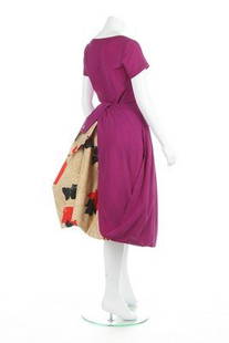 A Junya Watanabe/Comme des Garçons 'Japonism': A Junya Watanabe/Comme des Garçons 'Japonism' bustle-backed dress, Spring-Summer, 1996, labelled, of purple moss crĂªpe with complex criss-cross gored panels to the skirt front, open at the back with