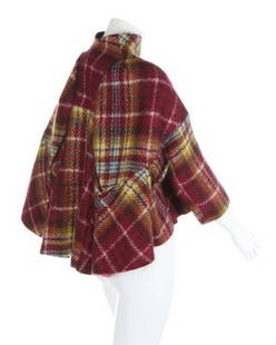 A Junya Watanabe/Comme des Garçons tweed mohair: A Junya Watanabe/Comme des Garçons tweed mohair transformation capelet/bag, 1999, labelled and size S, cut short at the front and long at the back dolman-style, with zips running over the shoulders