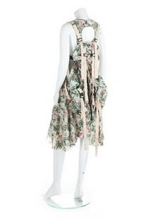 A Junya Watanabe/Comme des Garçons printed toile de: A Junya Watanabe/Comme des Garçons printed toile de jouy-style cotton pinafore dress with integral back-pack, Spring-Summer, 2003, labelled in green and pink with country scenes, ruched and gathered