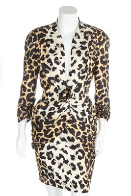 Jerry Hall's leopard print Thierry Mugler suit, 1990s,: Jerry Hall's leopard print Thierry Mugler suit, 1990s, labelled, the long, hip hugging jacket with curved neckline, fastened by fabric rose, short skirt, chest 92cm, 36in, waist 81cm, 32in (2) Provena