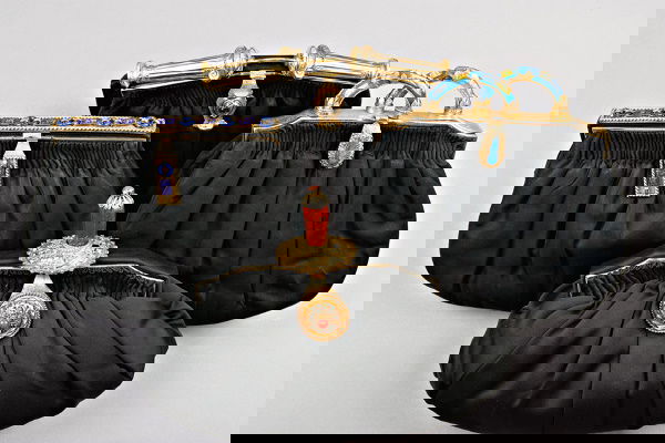 Two Au Seize evening bags, French, 1930s, the firs: Two Au Seize evening bags, French, 1930s, the first with Egyptian inspired enamelled clasp, the other with 'lapis' handles, together with a Morabito velvet bag with paste clasp, approx. size 24cm, 9 1