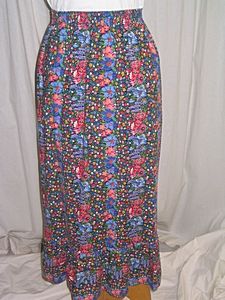 A group of designer skirts, 1970s, approx. 12 pie: A group of designer skirts, 1970s, approx. 12 pieces, including Liberty printed cottons, two Hermes wools, Guy Laroche, Italian silks, and others, (12)