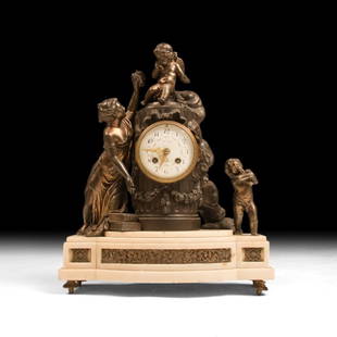 Neoclassical Mantle Clock with Venus and Cherubs: This charming 19th century Neoclassical bronze and marble mantle clock features Venus, goddess of love feeding cherubs grapes. The porcelain dial features Arabic numerals and gold hands. Measures 17 x