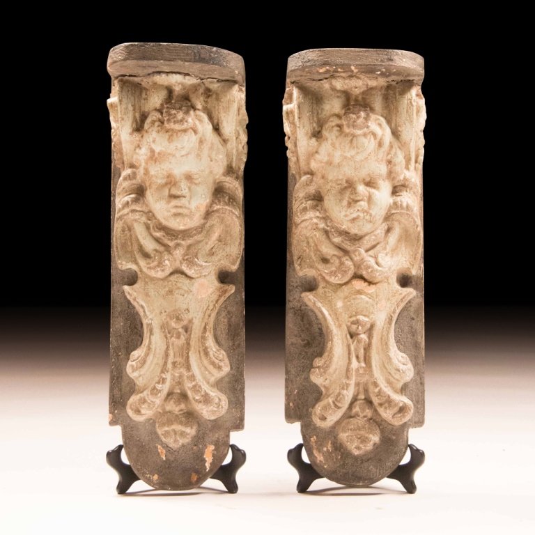 Pair of Early 20th Century Italian Wood Brackets: This pair of early 20th century Italian carved wood Neoclassical-style wall brackets features hand-painted Amorini figures. Measures 24 x 8 x 7 inches. Condition: Very Good