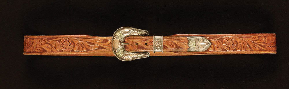 Oral Roberts’ Personal Bohlin Belt and Buckle Set: Oral Roberts’ personal floral pattern leather belt with his name prominently carved in the center. Mounted with a one-inch 3-piece 12K, 16K and 22K three-color (yellow, rose and green) gold Edward H