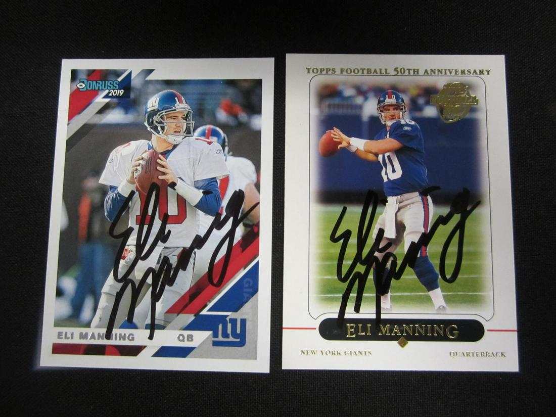 LOT OF 2 ELI MANNING SIGNED TRADING CARDS W/COA: All signed items come with a coa. Please research the autograph expert/company that provided coa before bidding. Cards might have rounded corners or creases. Please see photos for details. All sales a