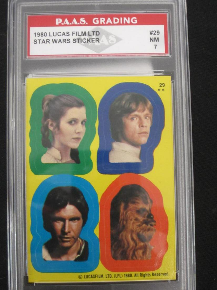 80 STAR WARS LUKE LEIA HANS CHEWY NM 7: VERY NICE 1980 TOPPS THE EMPIRE STRIKES BACK STICKER CARD #29 PRINCESS LEIA LUKE SKYWALKER HAN SOLO AND CHEWBACCA GRADED PAAS NM 7 VERY NICE ICONIC CARD A TRUE MUST HAVE FOR ANY COLLECTOR!