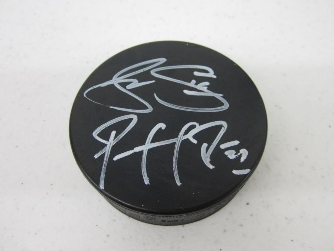 ROY/SAKIC SIGNED HOCKEY PUCK W/COA: PATRICK ROY/JOE SAKIC SIGNED HOCKEY PUCK WITH HERITAGE COA