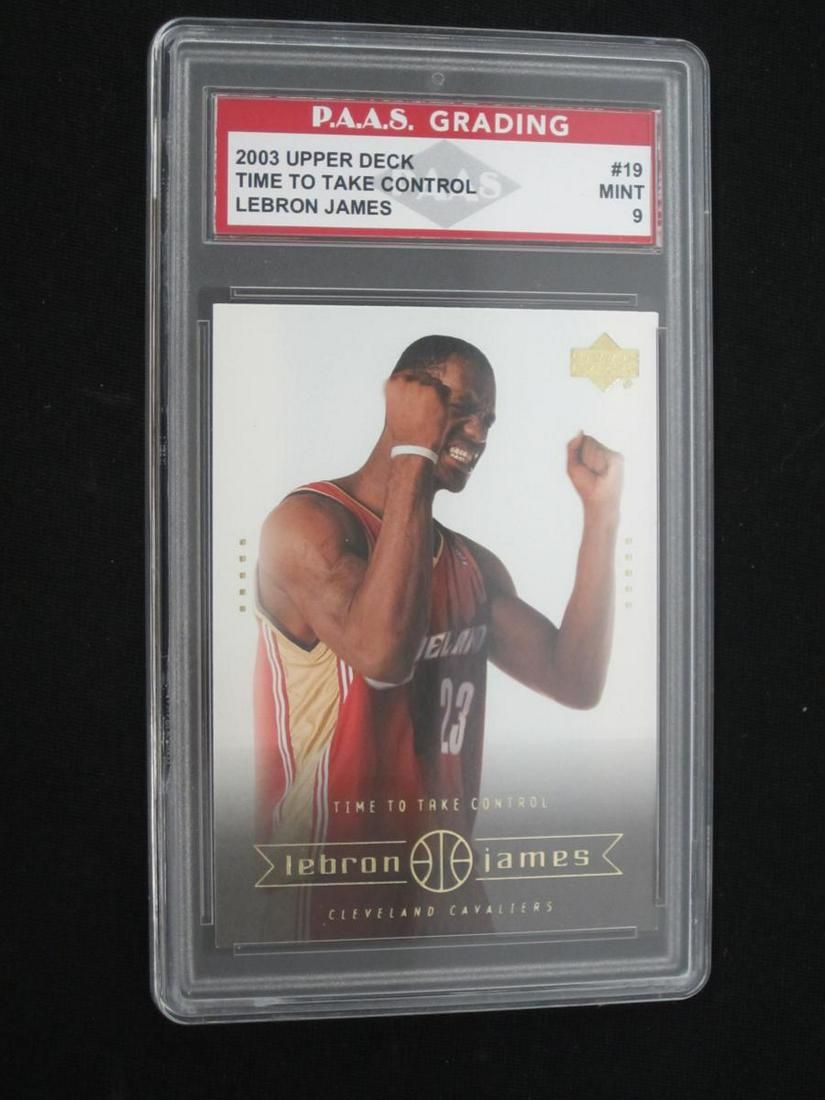 03-04 UD LEBRON JAMES RC PAAS MINT 9: VERY NICE 2003-04 UPPER DECK LEBRON JAMES TIME TO TAKE CONTROL ROOKIE CARD GRADED PAAS MINT 9 THIS CARD HAS BEEN PROFESSIONALLY GRADED & ENCASED. CHECK OUR OTHER AUCTIONS FOR A WIDE RANGE OF COLLECTIB