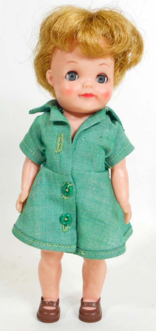 Vintage Effanbee Fluffy: Hard rubber wearing girl scout uniform.