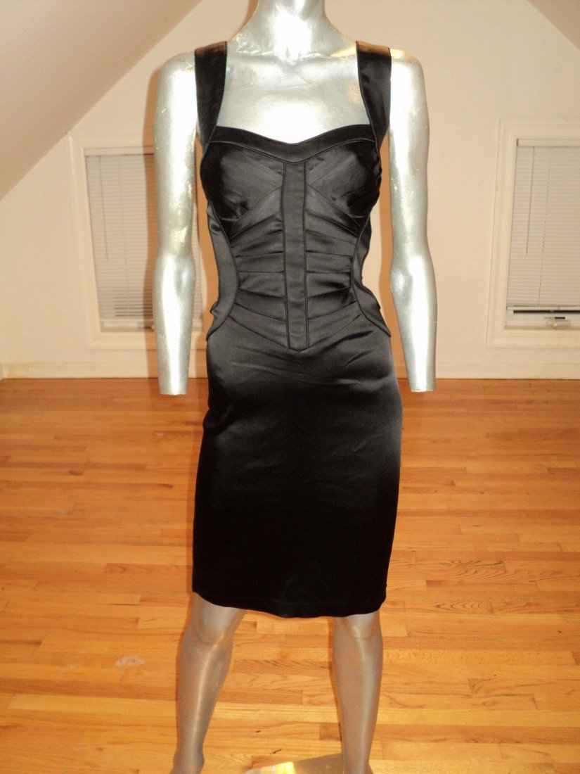 Calvin Klein Couture BodyCon Bandage Dress Liquid satin: Herve leger inspired This Calvin Klein Is drop dead Gorgeous.It is a Mini Bandage dress with Amazing details and finish.In a Liquid satin. Truly Enhances the female silhouette. A true winnerMeasures:B