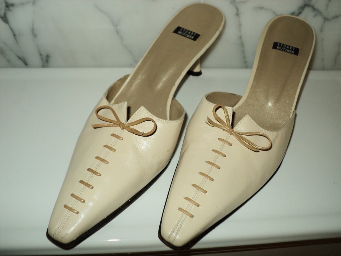 Stuart Weitzman Leather Open Back Pump Shoes Lace Front: These are Beautiful Open back Spring Open backs Pumps with Laced front.All Leather beautifully Made and Finished.Front Bow Size 10 1/2 BInsole-11"Outsole-12"heel-3"