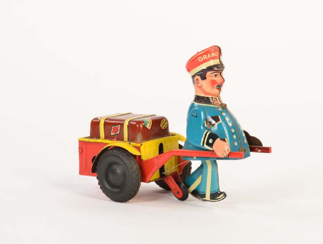 Geiger, Gepaeckmann: Geiger, Gepaeckmann, W.-Germany, 11 cm, Blech, UW ok, min. LM, Z 2+
