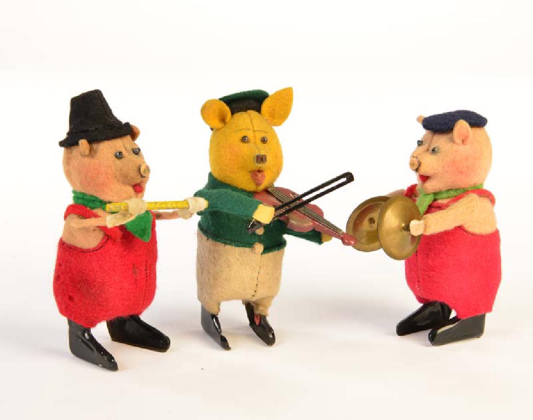 Schuco Kopie, 3 Musik Schweinchen (1 of 1)
