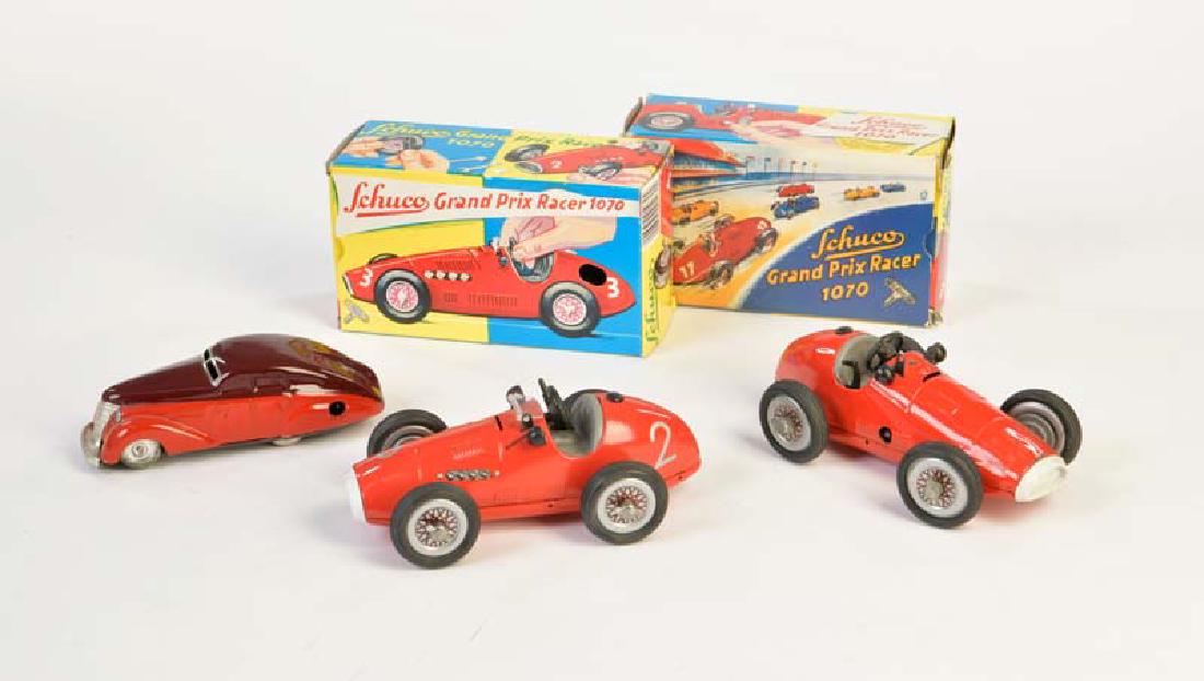 Schuco, 2 Grand Prix Racer + Patenauto 1010: Schuco, 2 Grand Prix Racer + Paten Car 1010, tin, cw ok, new productions, 1 pane missing, C 2/3+