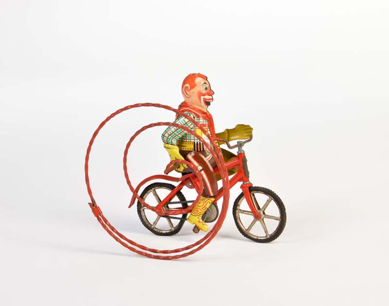 Gescha, Cowboy mit Lasso auf Fahrrad (1 of 1)